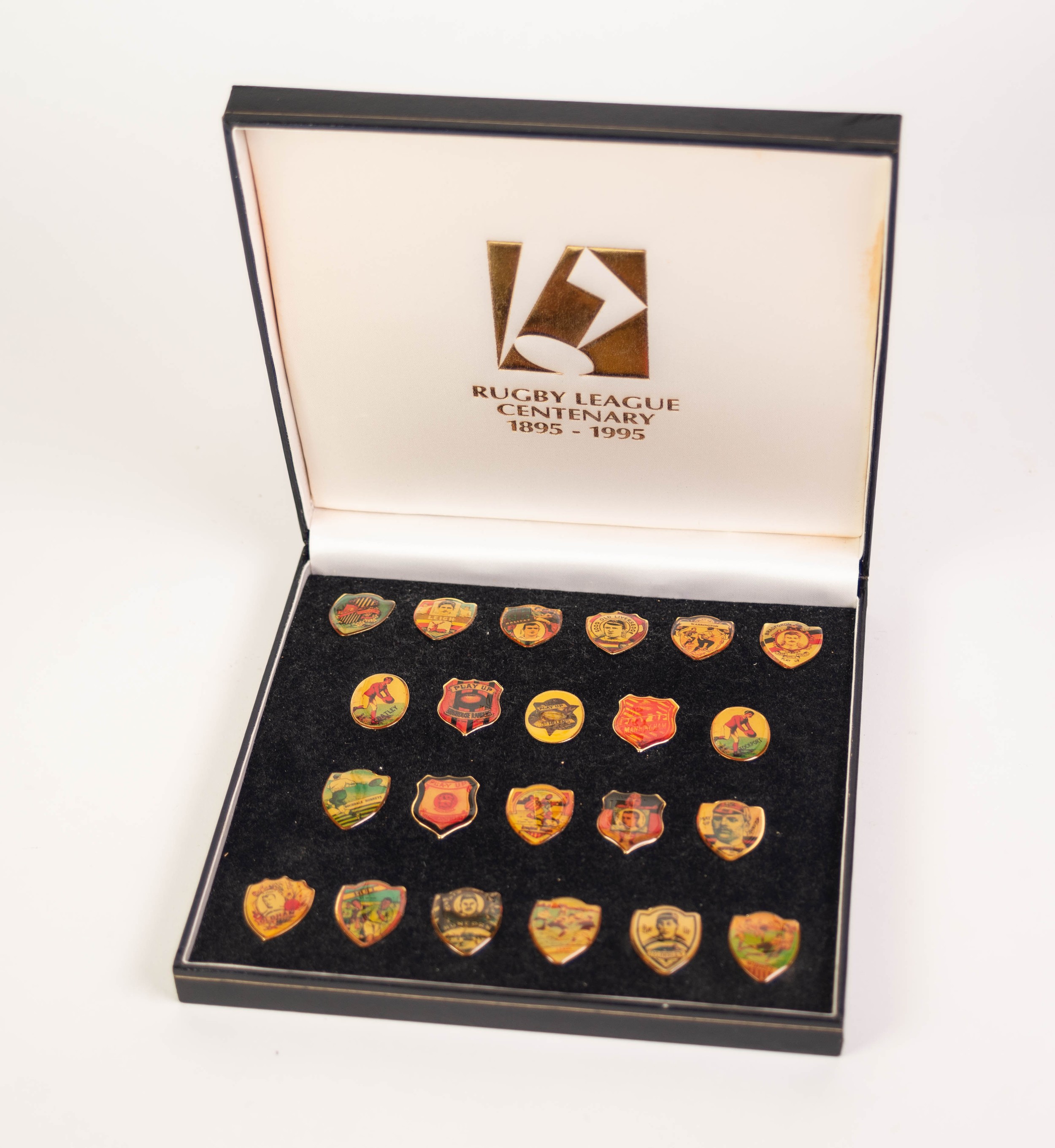 SMT ASSOCIATES LIMITED BOXED SET OF TWENTY TWO SHIELD SHAPED PINS, RUGBY LEAGUE CENTENARY 1895-