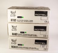 AUDIO EQUIPMENT. A boxed Rotel Stereo Integrated Amplifier model RA02 (black). A boxed Rotel AM/FM
