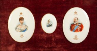 PAIR OF ROYAL DOULTON OVAL PORCELAIN PLAQUES, with printed bust portraits of Edward VII and Queen