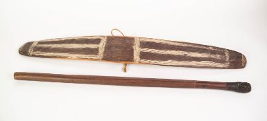 AUSTRALIAN ABORIGINAL CARVED AND PAINTED WOOD, WUNDA SHIELD of propeller shape with hand grip carved