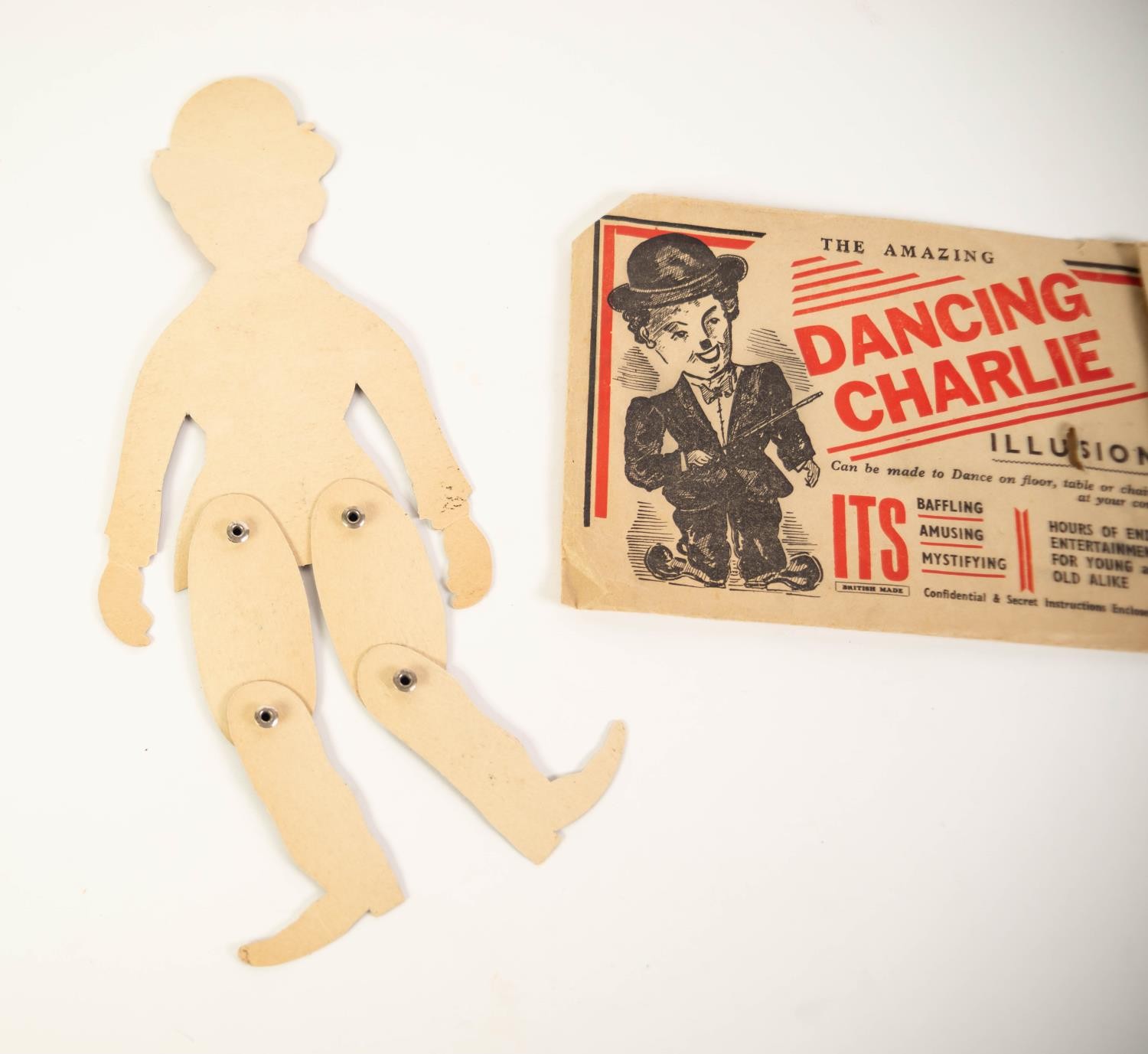 VINTAGE CIRCA 1930's 'THE AMAZING - DANCING CHARLIE' (CHAPLIN) ILLUSION DANCING FIGURE, colour - Image 2 of 2