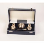 BOXED THREE PIECE POST-WAR HALLMARKED SILVER CONDIMENT SET AND SPOON, of pear shape, the mustard pot