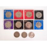 ELEVEN QUEEN ELIZABETH II COMMEMORATIVE CROWN COINS, seven being related and dated hard plastic