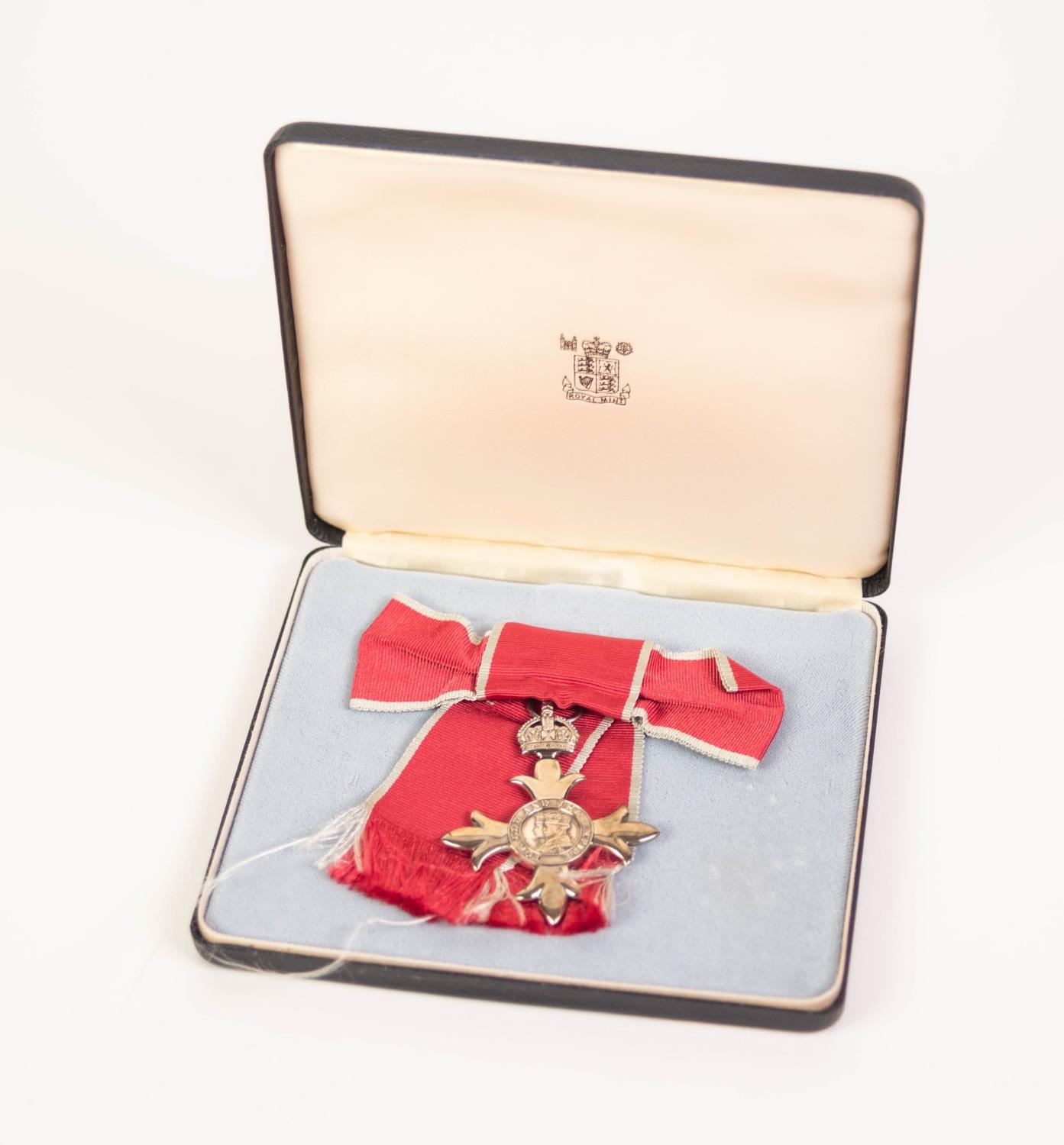 GEORGE V M.B.E. MEDAL and ribbon, in case with card