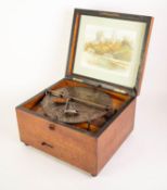 A LATE NINETEENTH CENTURY SYMPHONION TABLE DISC MUSIC BOX, playing 10" (25.4cm) discs on a 4 1/4" (