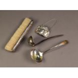VICTORIAN FLORAL EMBOSSED SILVER BACKED HAT BRUSH, London 1882, together with a ?CARTIER?