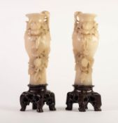 PAIR OF CARVED OFF WHITE SOAPSTONE BALUSTER FORM TALL VASES, carved in alto relief with trailing