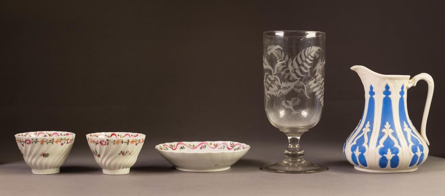 PAIR OF NEWHALL PORCELAIN TEA-BOWLS AND A MATCHING SAUCER, each of wrythen fluted for with floral