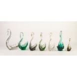 SEVEN WHITEFRIARS GLASS MODELS OF SWANS, comprising: TWO CLEAR, TWO TURQUOISE, ONE GREEN and TWO