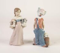 LLADRO PORCELAIN CLOWN FIGURE and another of a LITTLE GIRL carrying two puppies, both 8in (20.5cm)