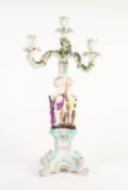 EARLY TWENTIETH CENTURY SITZENDORF, GERMAN FLORAL ENCRUSTED PORCELAIN FIGURAL FOUR LIGHT CANDELABRA,