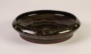 1960s NIGERIAN STUDIO POTTERY SHALLOW BOWL, with turned over rim, by Ladi Kwali (1925 - 1984), the