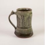 1960s NIGERIAN STUDIO POTTERY TANKARD by Ladi Kwali (1925 - 1984), the red earthenware body