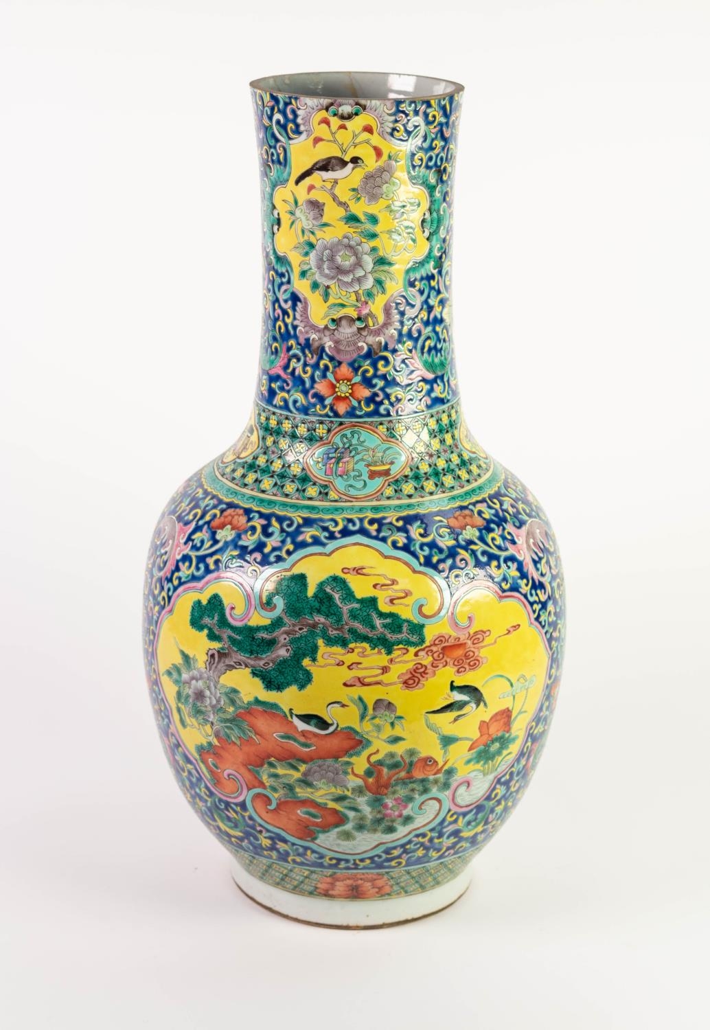 CHINESE QING DYNASTY PORCELAIN BOTTLE SHAPE VASE, the whole decorated in felangcai enamels, the