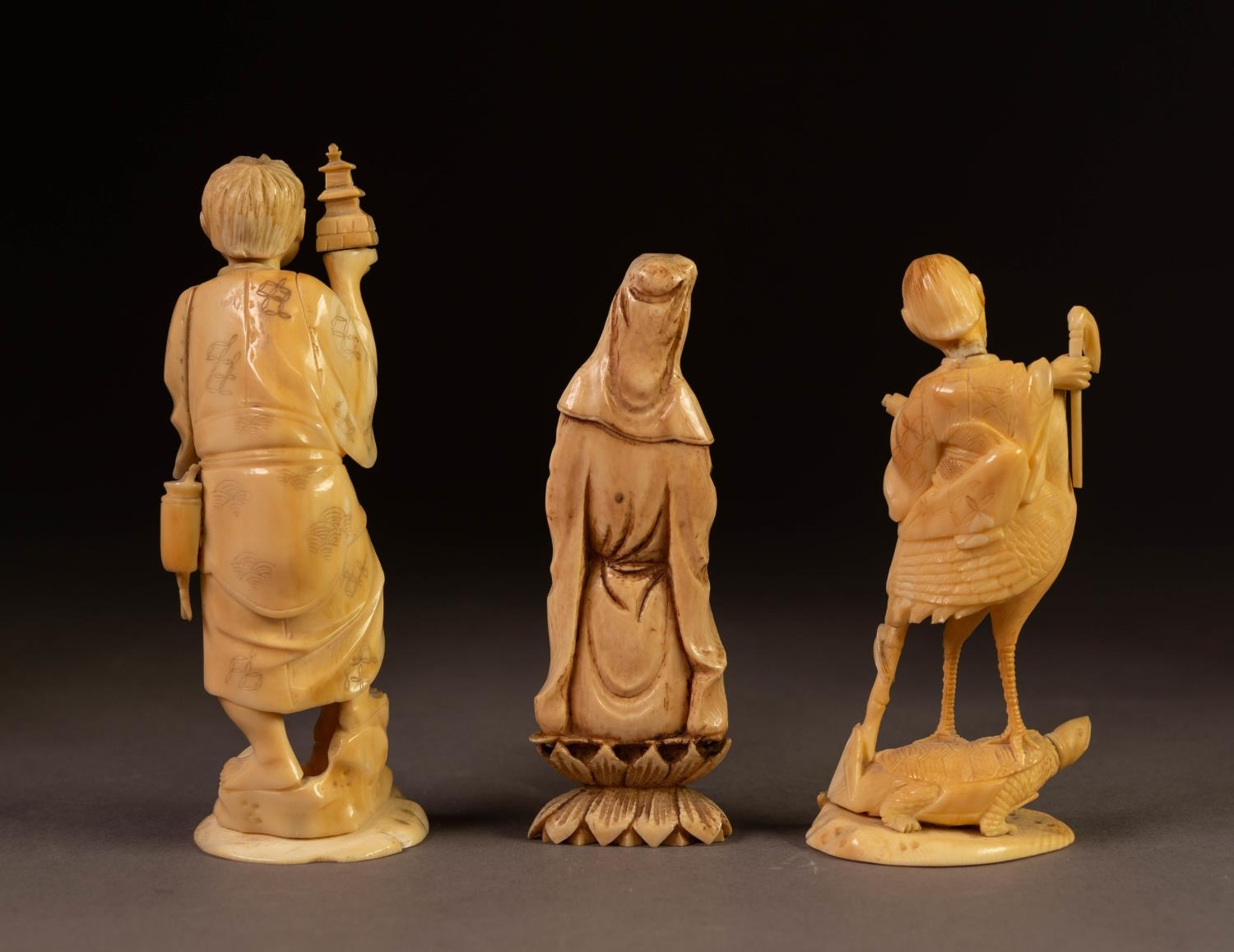 THREE JAPANESE LATE MEIJI PERIOD CARVED IVORY OKIMONO, one modelled as a STREET VENDOR, another of - Image 2 of 2