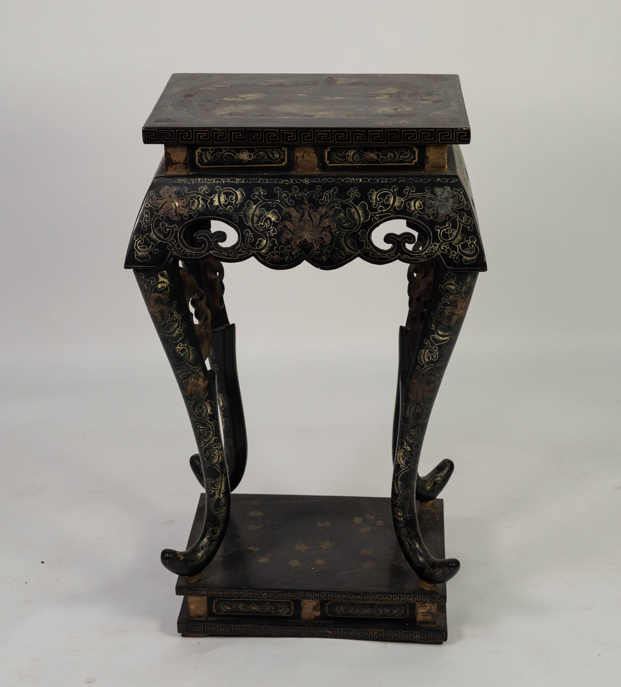 TWENTIETH CENTURY ORIENTAL BLACK LACQUERED OCCASIONAL TABLE OR URN STAND, the oblong top gilt