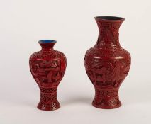 TWO CHINESE CARVED RED CINNABAR LACQUERED VASES, one of baluster form with waisted neck, carved with
