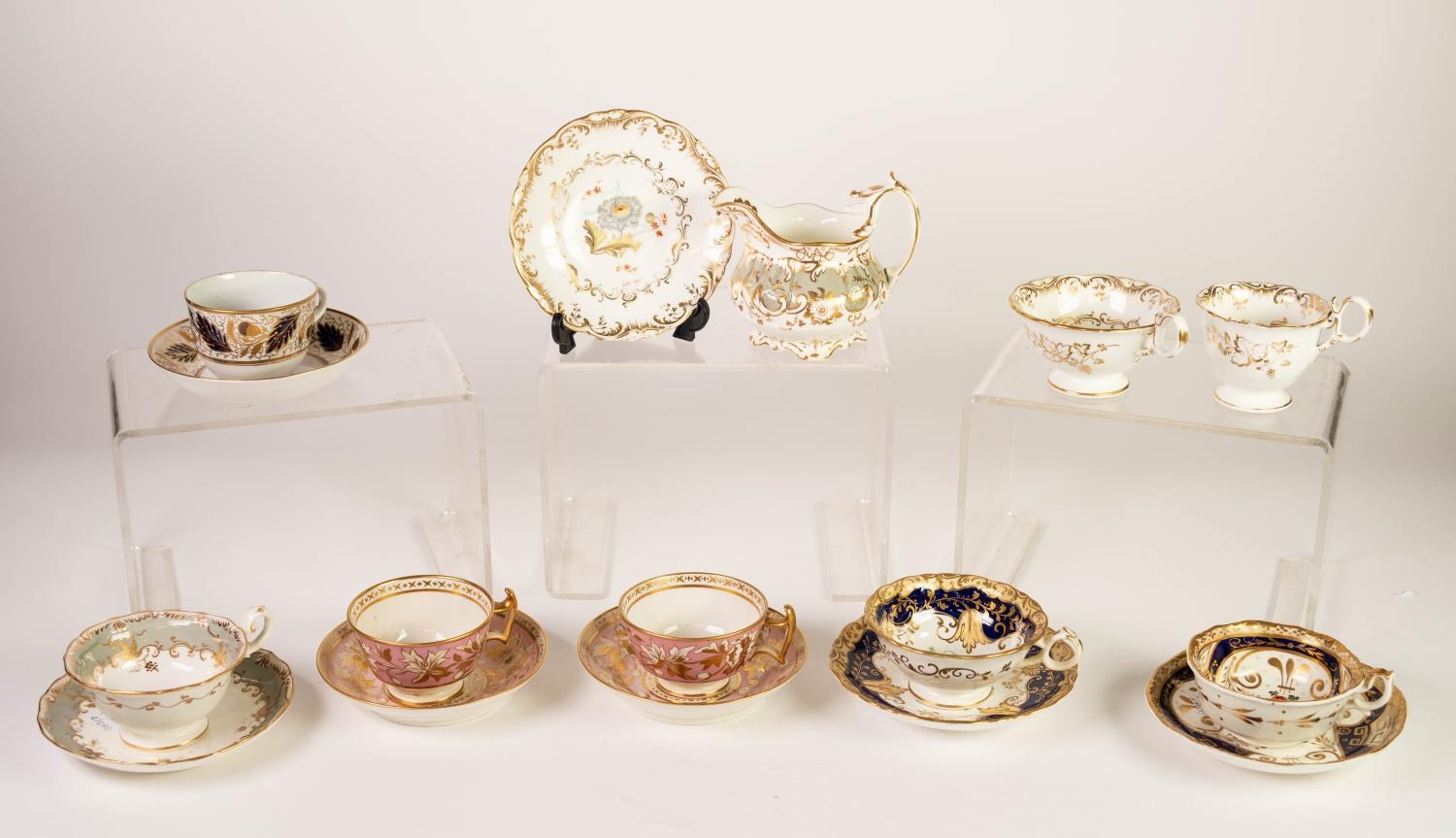 EARLY 19th CENTURY SPODE PORCELAIN TEACUP AND SAUCER, blue enamel and richly gilt with oak leaves