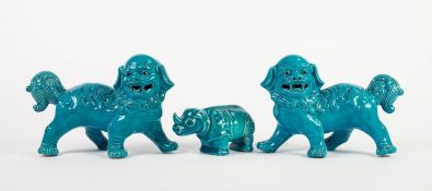 PAIR OF ORIENTAL STYLE TURQUOISE GLAZED BUDDHISTIC LIONS and an oriental style turquoise glazed