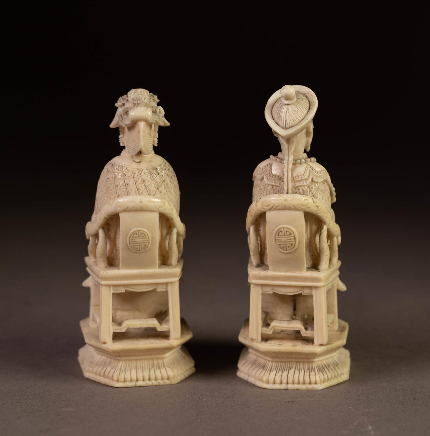 PAIR OF JAPANESE MEIJI PERIOD CARVED IVORY SEATED FIGURES, modelled as a male and female mandarin, - Image 2 of 4