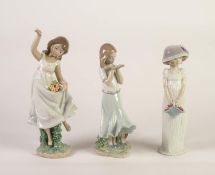 THREE LLADRO MODELS OF YOUNG GIRLS, two modelled with flowers, (6580 and 8022), the other with a