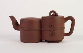 CHINESE LATE QING/REPUBLIC PERIOD YI HSING (KIANSU PROVINCE) RED STONEWARE DOUBLE TEAPOT, formed