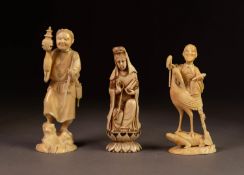 THREE JAPANESE LATE MEIJI PERIOD CARVED IVORY OKIMONO, one modelled as a STREET VENDOR, another of