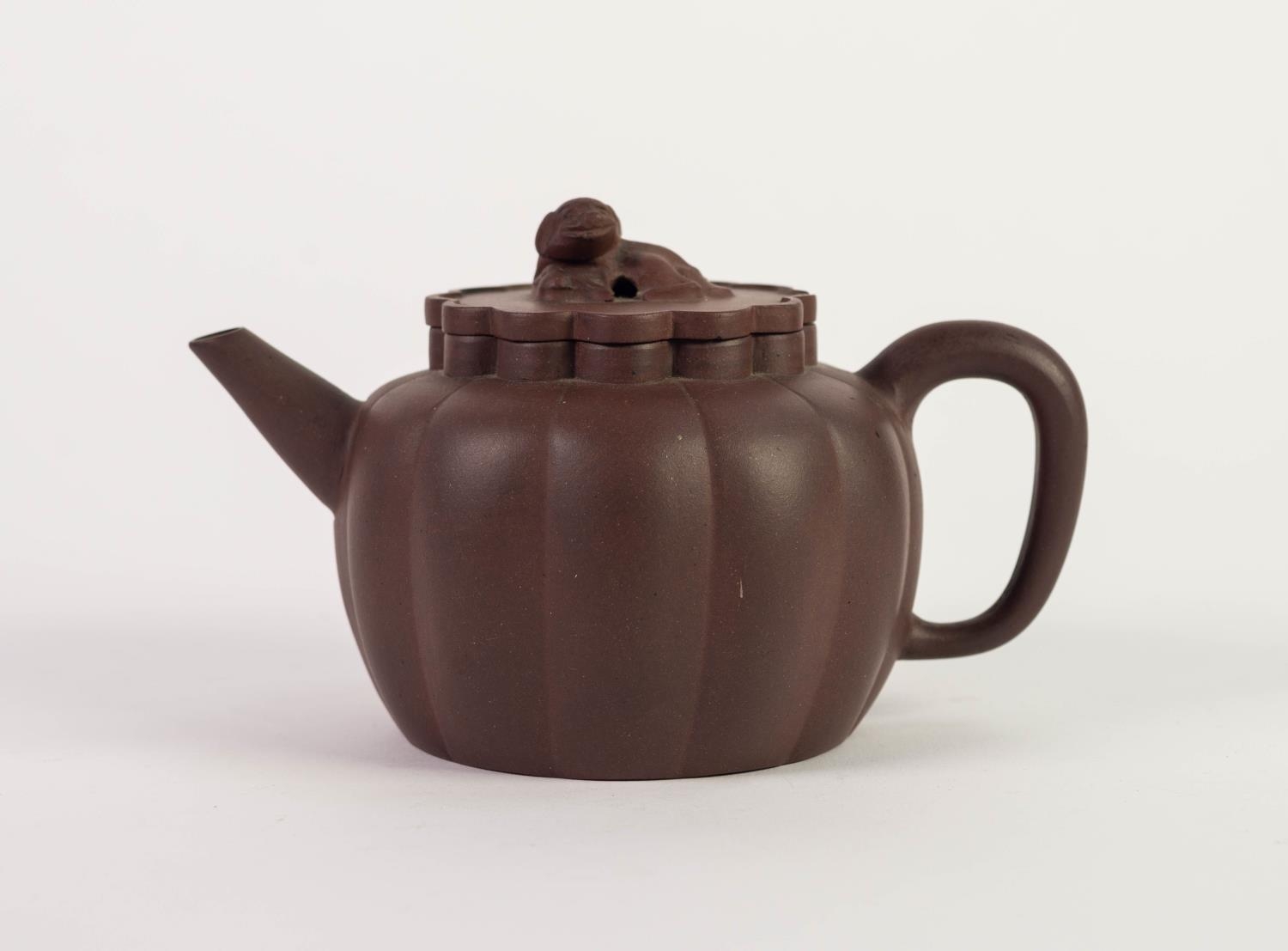 CHINESE QING DYNASTY YI HSING (KIANGSU PROVINCE) REDDISH BROWN STONEWARE TEAPOT of watermelon form