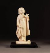 JAPANESE MEIJI PERIOD WELL CARVED ONE PIECE IVORY OKIMONO, modelled as a young girl holding a bird
