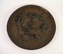 JAPANESE MEIJI PERIOD PATINATED AND CAST METAL WALL PLAQUE, of typical form, cast in relief with