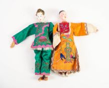 PAIR OF 20th CENTURY CHARACTER DOLLS with painted earthenware loose socket heads, painted wood lower