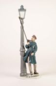 LLADRO PORCELAIN MODEL - LAMP LIGHTER, model number 5205, 18 3/4in (47.5cm) high (thumb chipped)