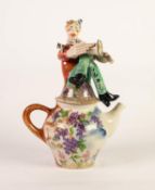 JULIA KIRILLOVA FIGURAL CERAMIC TEAPOT, modelled with a seated saxophone player to the cover, the