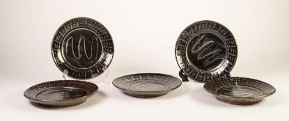 FIVE SMALL 1960s NIGERIAN STUDIO POTTERY SHALLOW DISHES BY LADI KWALI (1925 - 1984), the red