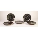 FIVE SMALL 1960s NIGERIAN STUDIO POTTERY SHALLOW DISHES BY LADI KWALI (1925 - 1984), the red