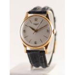 GENT'S LONGINES 9ct GOLD WRISTWATCH with automatic movement, white circular dial with four arabic