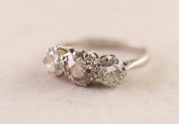 UNMARKED WHITE GOLD/PLATINUM THREE STONE DIAMOND SET RING, the larger .81ct, the smaller stones each