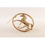 Designed by Tonie Taylor for Ivan Tarratt, a 9ct GOLD OPEN WORK LARGE CIRCLET BROOCH framing a