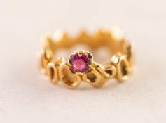 18ct GOLD FANCY BAND RING set with a single ruby, hallmarked London 1970, 5.93 gms, ring size M/N