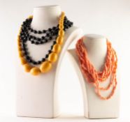 LONG FACET CUT JET BEAD NECKLACE; an incomplete graduated YELLOW BEAD NECKLACE and two BRANCH CORAL