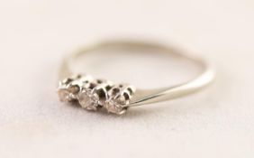 18ct WHITE GOLD AND PLATINUM RING, claw set with three small old cut diamonds, approximately .17ct