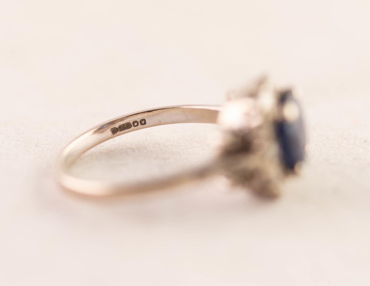 18ct GOLD RING set with a central cushion cut sapphire within a surround of twelve tiny diamonds, - Image 3 of 3