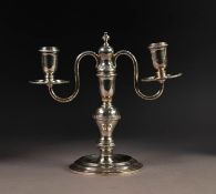 GEORGE VI SILVER TWIN BRANCH CANDELABRA, with scroll arms, slender Celtic borders, baluster