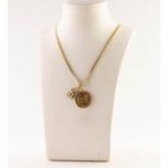 EDWARDIAN 1910 HALF SOVEREIGN (vf) in gold frame as a pendant, on an 18ct GOLD LONG CHAIN, with