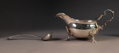 LATE GEORGE II SILVER SAUCE BOAT, with scallop cut rim, leaf capped scroll handle, standing on three