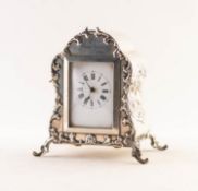 EDWARD VII SILVER CASED COMMEMORATIVE DRESSING TABLE CLOCK, the oblong, white enamelled, Roman dial,