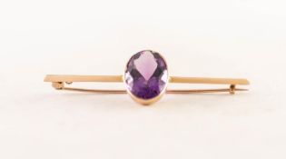 EDWARDIAN 15ct GOLD SHARP EDGE BAR BROOCH, collet set with a good, large oval amethyst, 6 gms gross