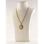 9ct GOLD PENDANT set with a small carved oval shell cameo and the gold coloured metal BELCHER