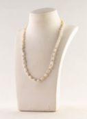 SINGLE STRAND NECKLACE OF BAROQUE PEARLS with 18ct gold clasp, the front with twenty gold tiny