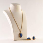 SUITE OF 9ct GOLD AND OPAL JEWELLERY OF THREE PIECES, each piece with a cabochon oval blue opal in a